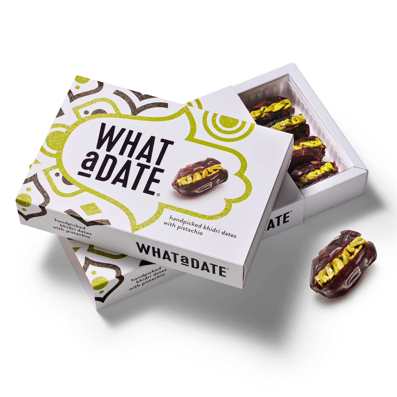 An open What a Date Pistachio Large Box showing 12 of their handpicked, hand-filled dark dates with a rich pistachio filling, in a white gift box with a green motif. Handmade filling of thick slivers of Sicilian pistachio gently baked in artisanal date syrup. 
